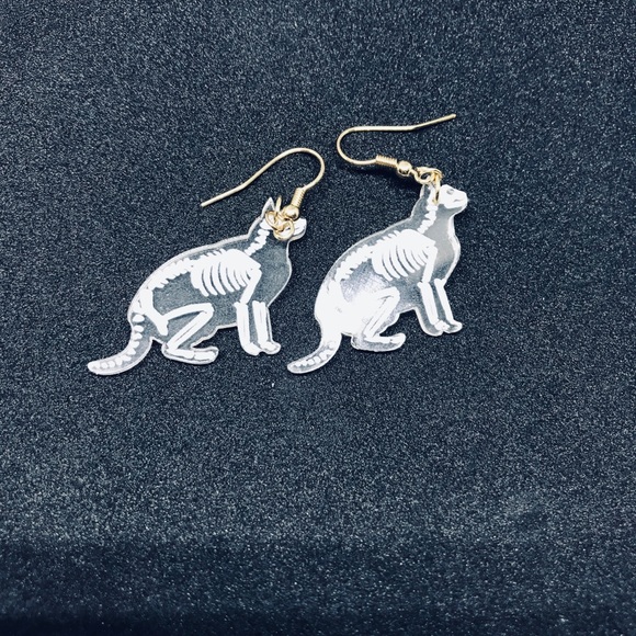 Acrylic cat skeleton x ray earrings. - Picture 3 of 7